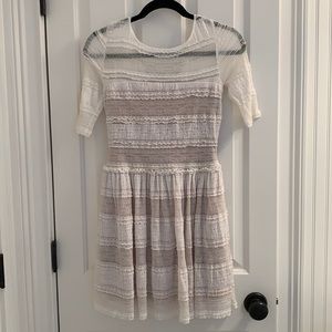 Flirty white lace BCBG mini dress